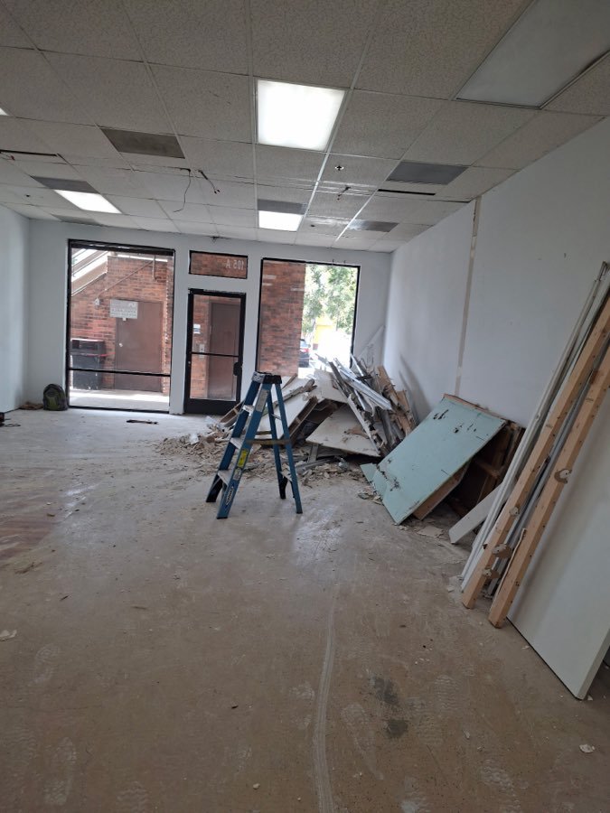 Before â€” Retail unit â€” tear-out debris cleared