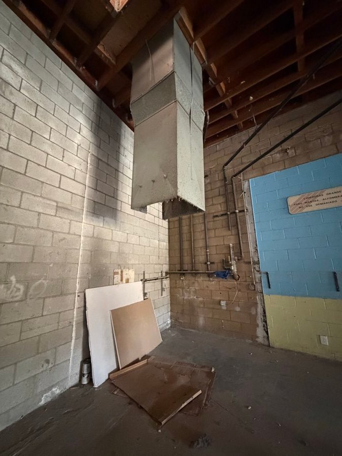 Before — Same job — back wall and duct area